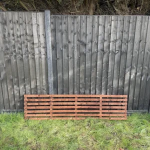6ft x 18inch slatted horizontal trellis fence panel in garden setting