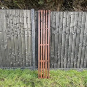6ft x 1ft slatted vertical trellis fence panel in garden setting
