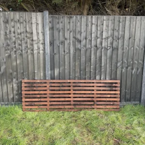 6ft x 2ft slatted horizontal trellis fence panel in garden setting