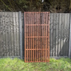 6ft x 3ft slatted vertical trellis fence panel in garden setting