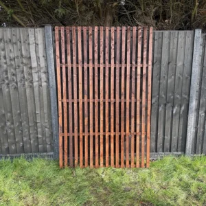 6ft x 4ft slatted vertical trellis fence panel in garden setting